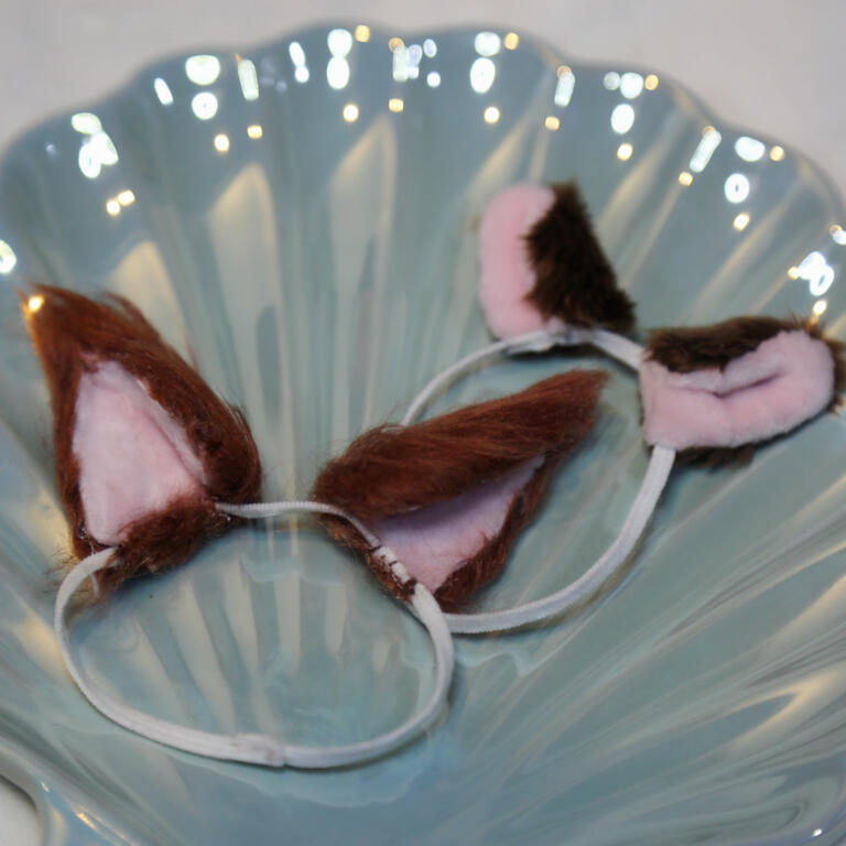 鬆緊帶上有些微縫紉痕跡，給娃娃戴上後不影響拍照